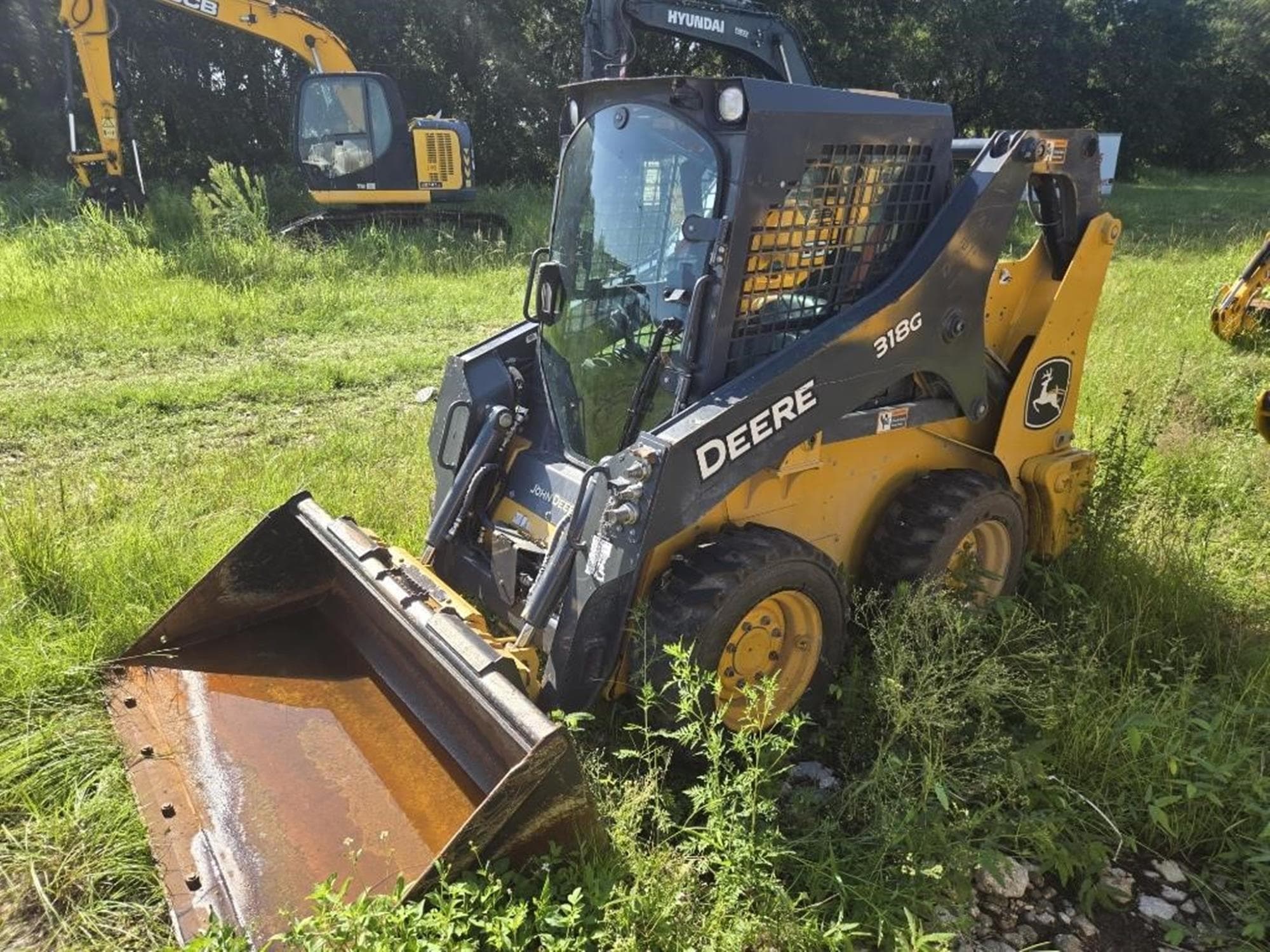 DEERE 318G vrWZlGk.jpeg